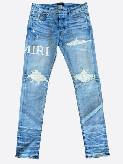 Amiri Perfect Indigo & White Serif Logo Distressed Jeans
