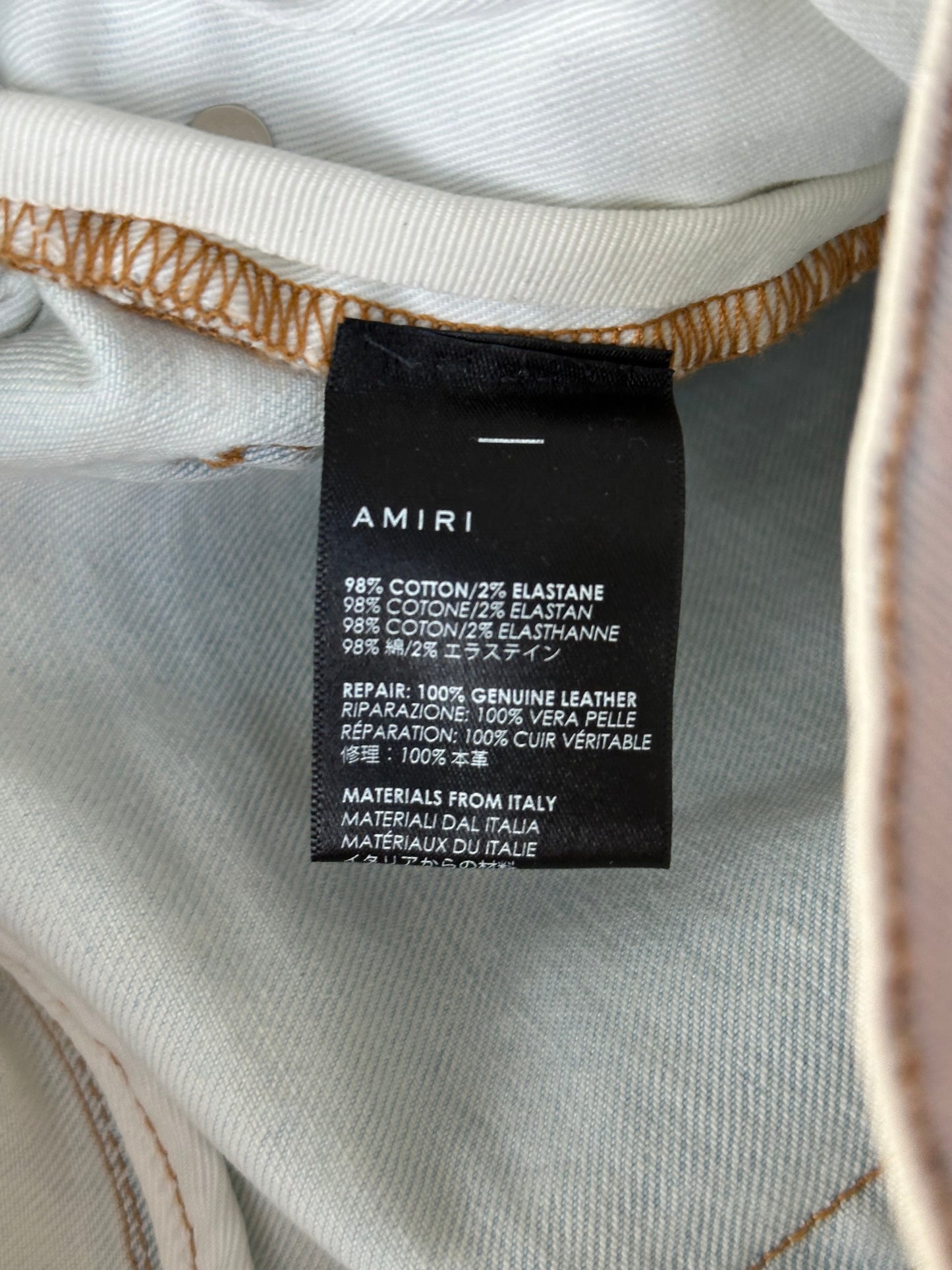 Amiri Light Indigo & Black Patch MX1 Jeans