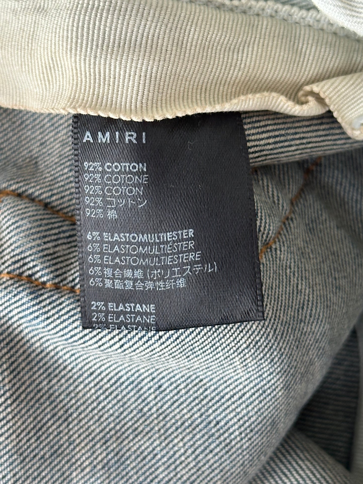 Amiri Indigo Fractured Skinny Jeans