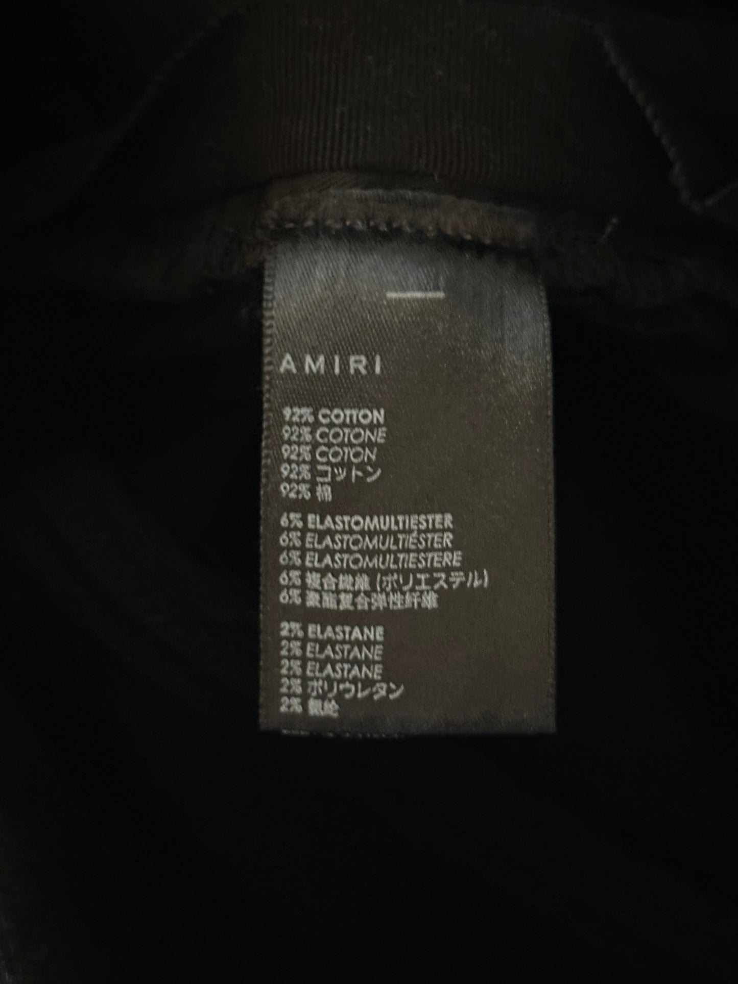 Amiri Black Travel Patch Repair Jeans