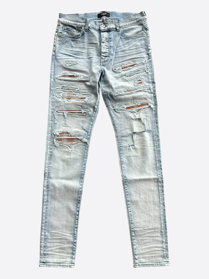 Amiri Light Indigo Orange Patch Thrasher Jeans