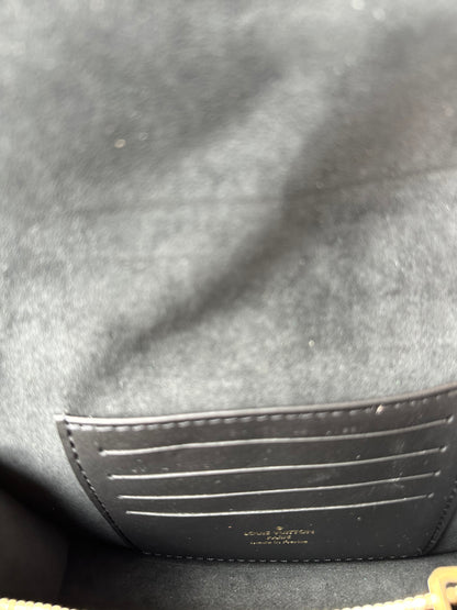 Louis Vuitton Reverse Monogram Dauphine Chain Wallet