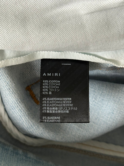 Amiri Light Indigo Distressed Painter Jeans