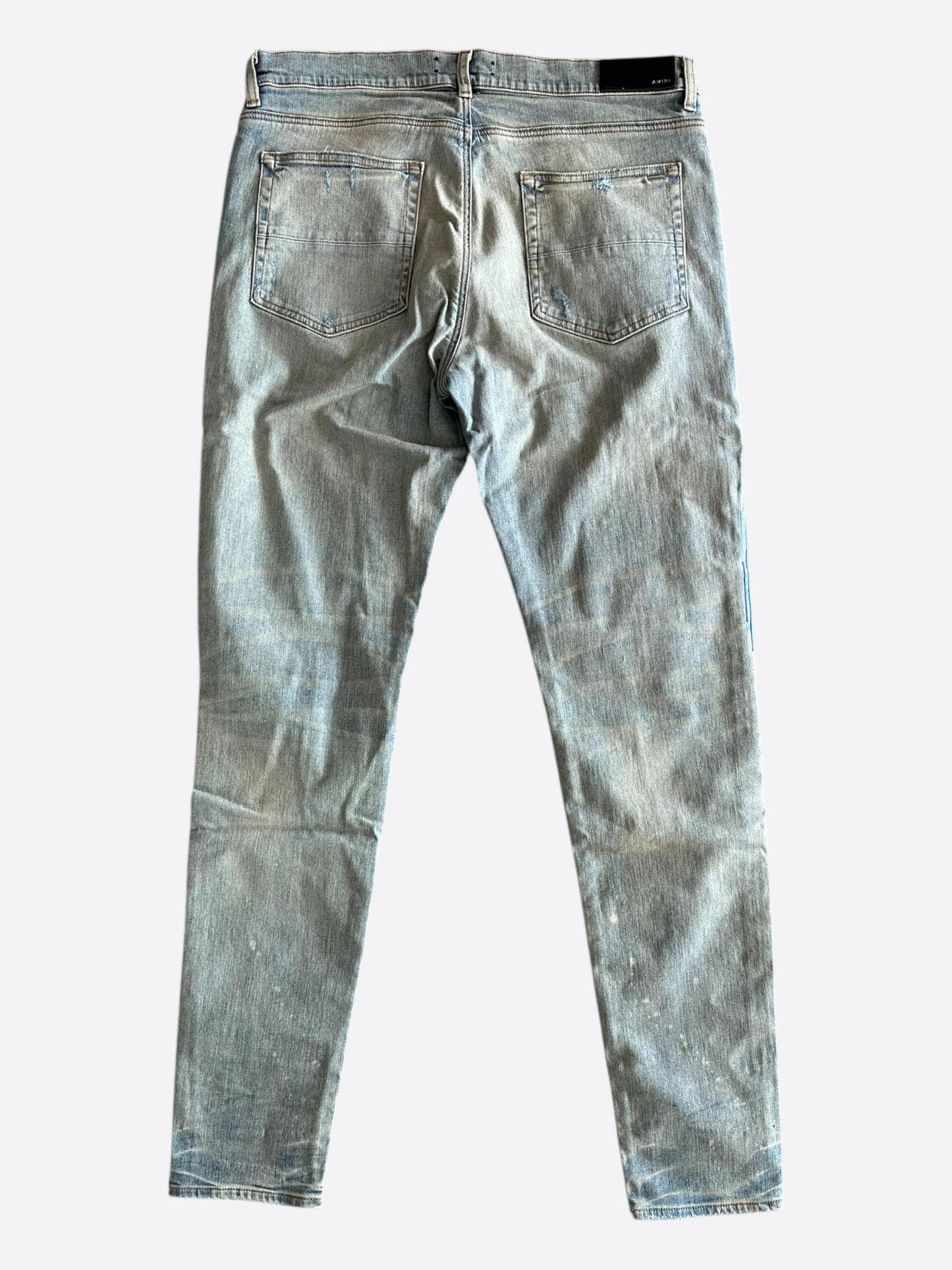 Amiri Clay Indigo Paint Drip Logo Jeans