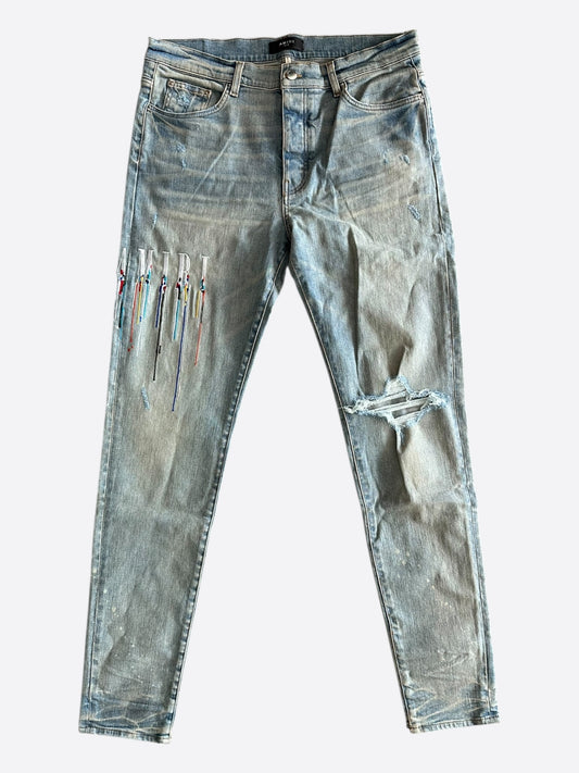 Amiri Clay Indigo Paint Drip Logo Jeans