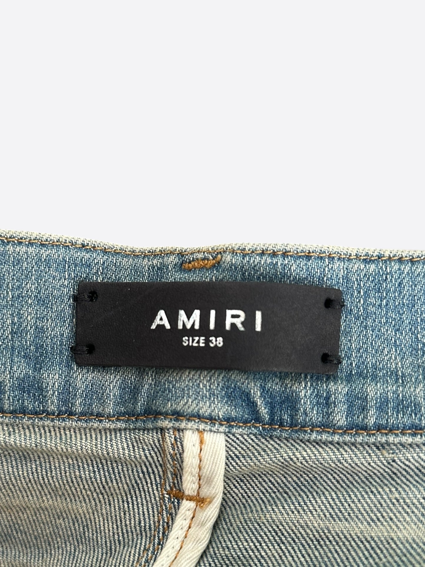 Amiri Clay Indigo Paint Drip Logo Jeans