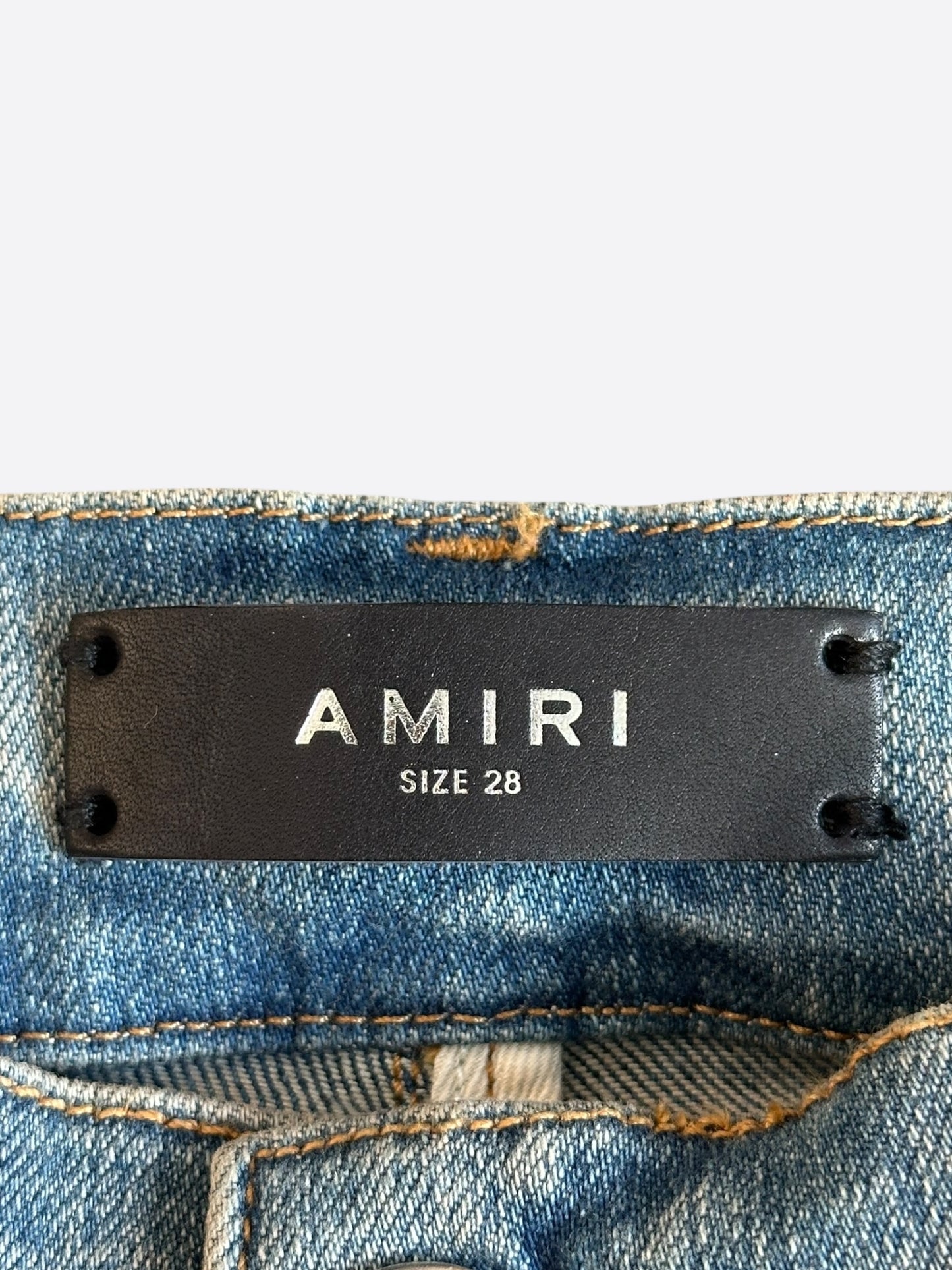Amiri Clay Indigo Quilted Patch Jeans