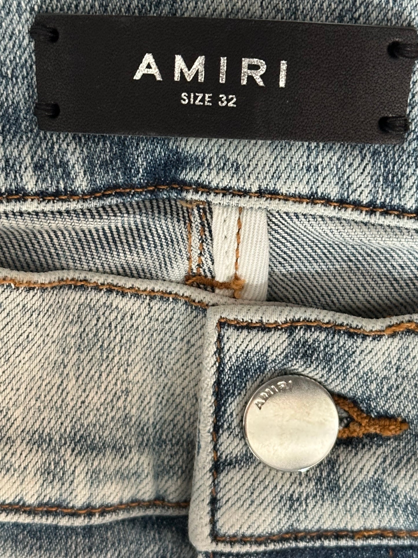 Amiri Stone Indigo Black Leather Patch Thrasher Jeans