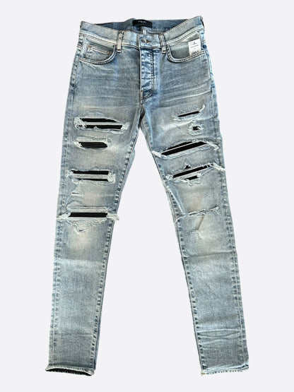 Amiri Stone Indigo Black Leather Patch Thrasher Jeans