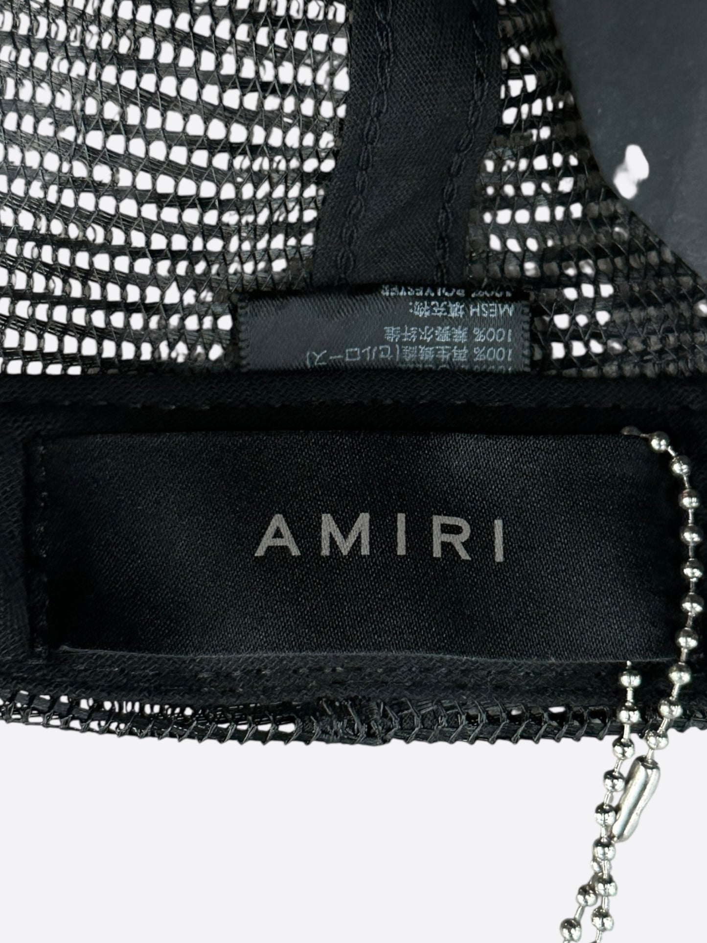 Amiri Black & White Staggered Logo Trucker Hat