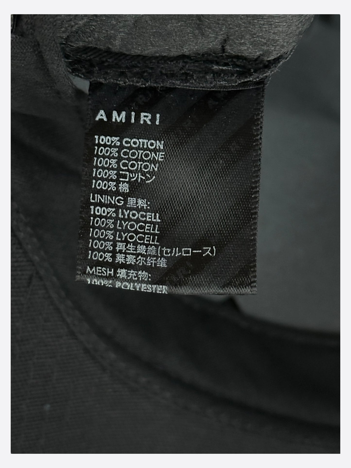 Amiri Black & White Staggered Logo Trucker Hat