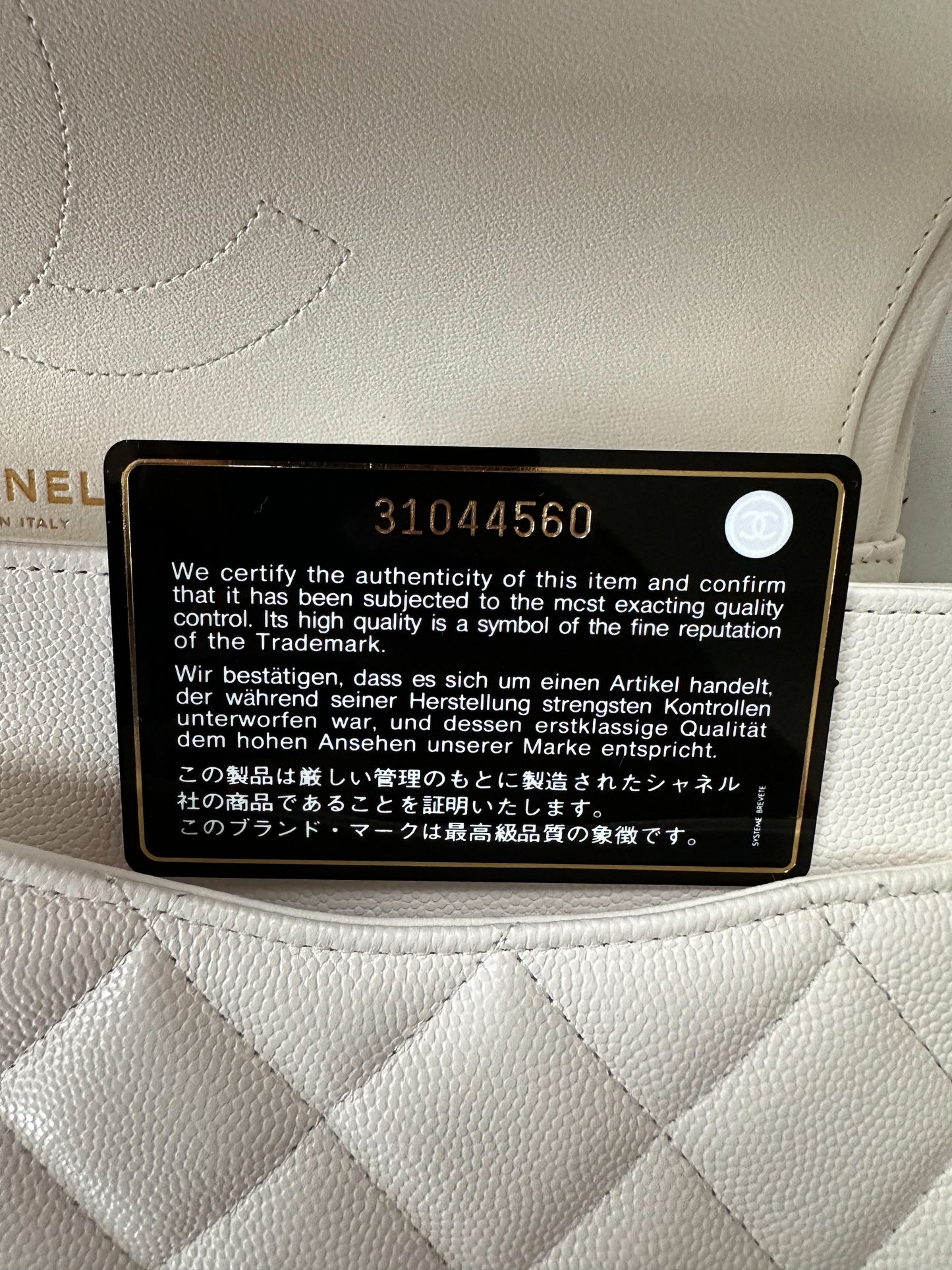 Chanel Ivory Caviar Jumbo Double Flap Bag