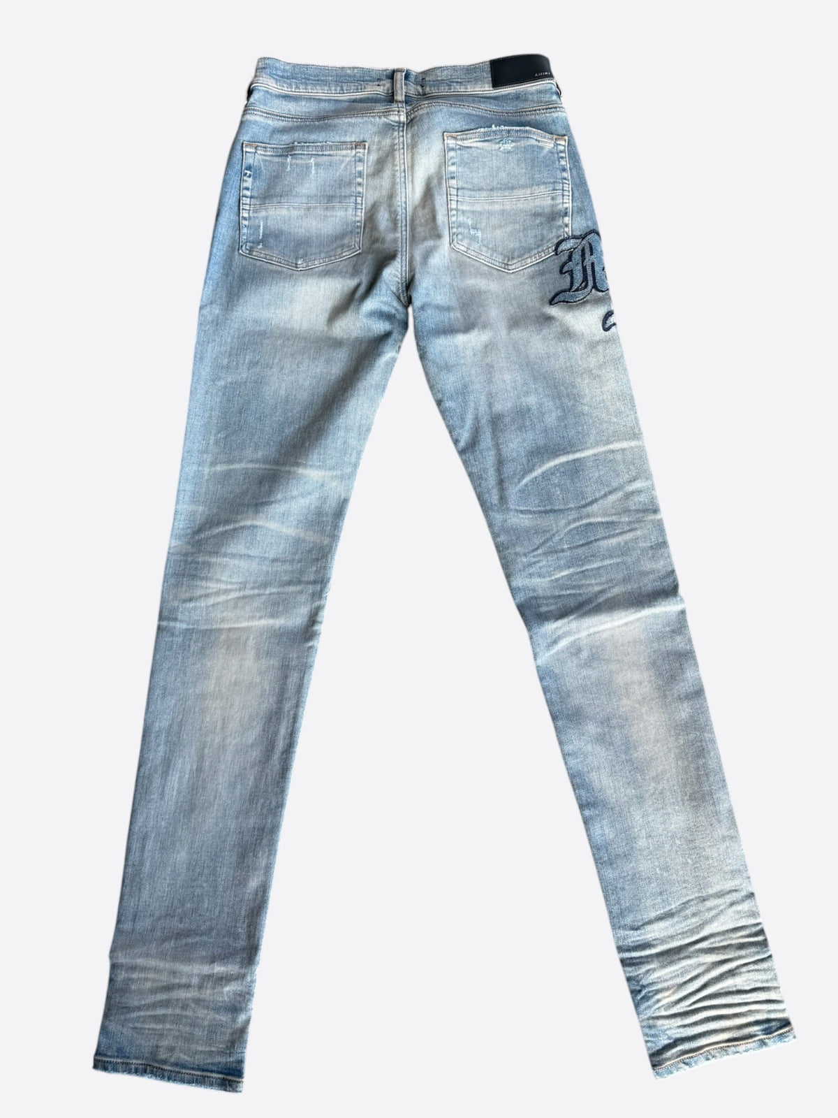 Amiri Clay Indigo Distressed MA Varsity Repair Jeans