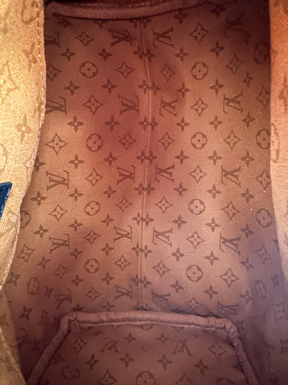 Louis Vuitton Orange Crafty Monogram Speedy 25