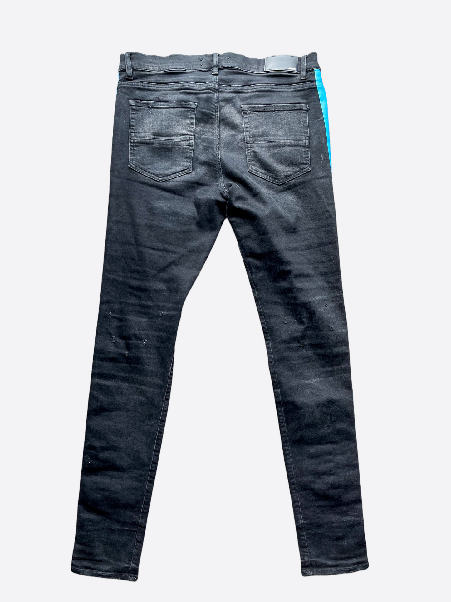 Distressed track denim jeans shop