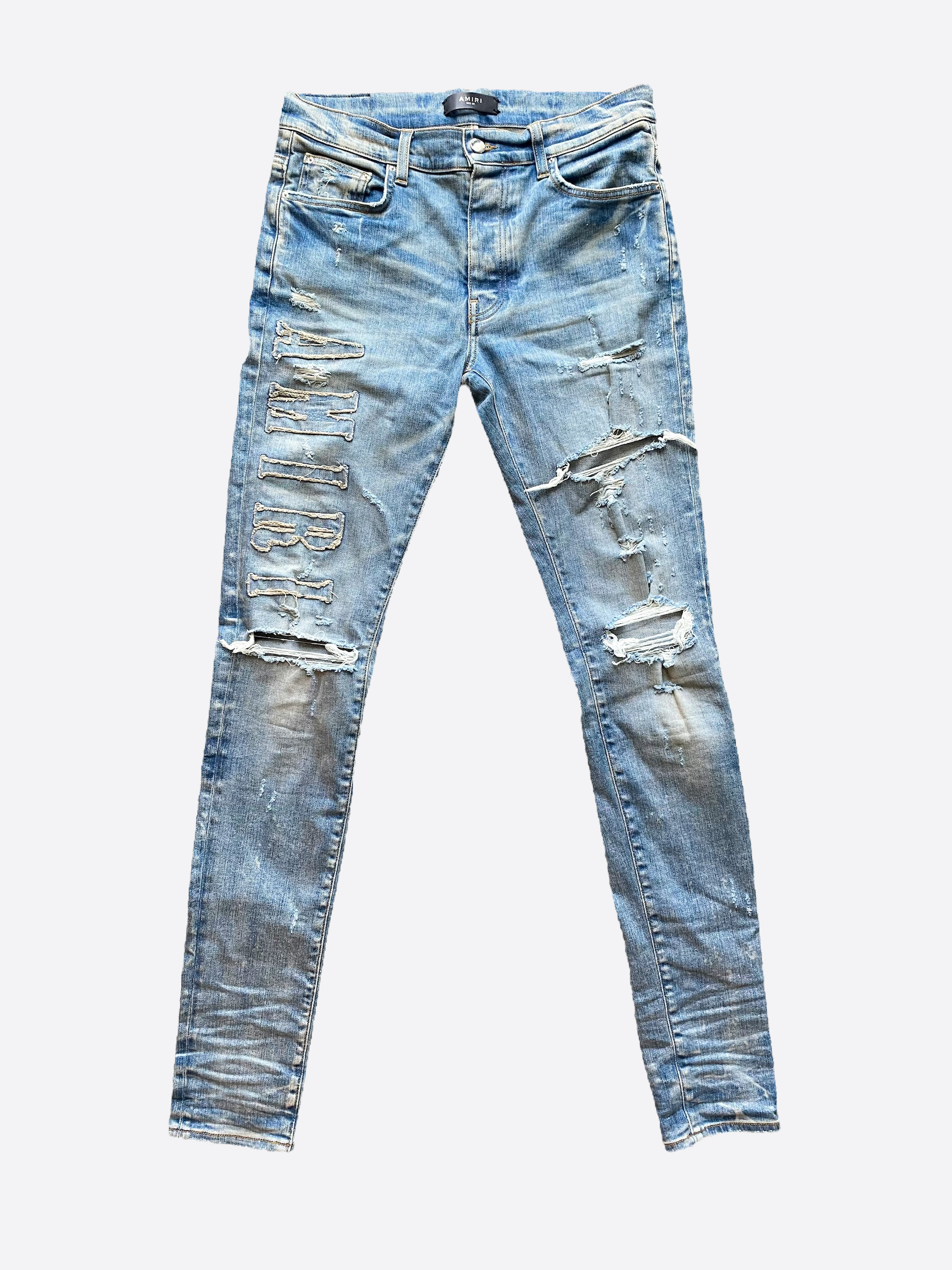 Amiri blue ripped deals jeans