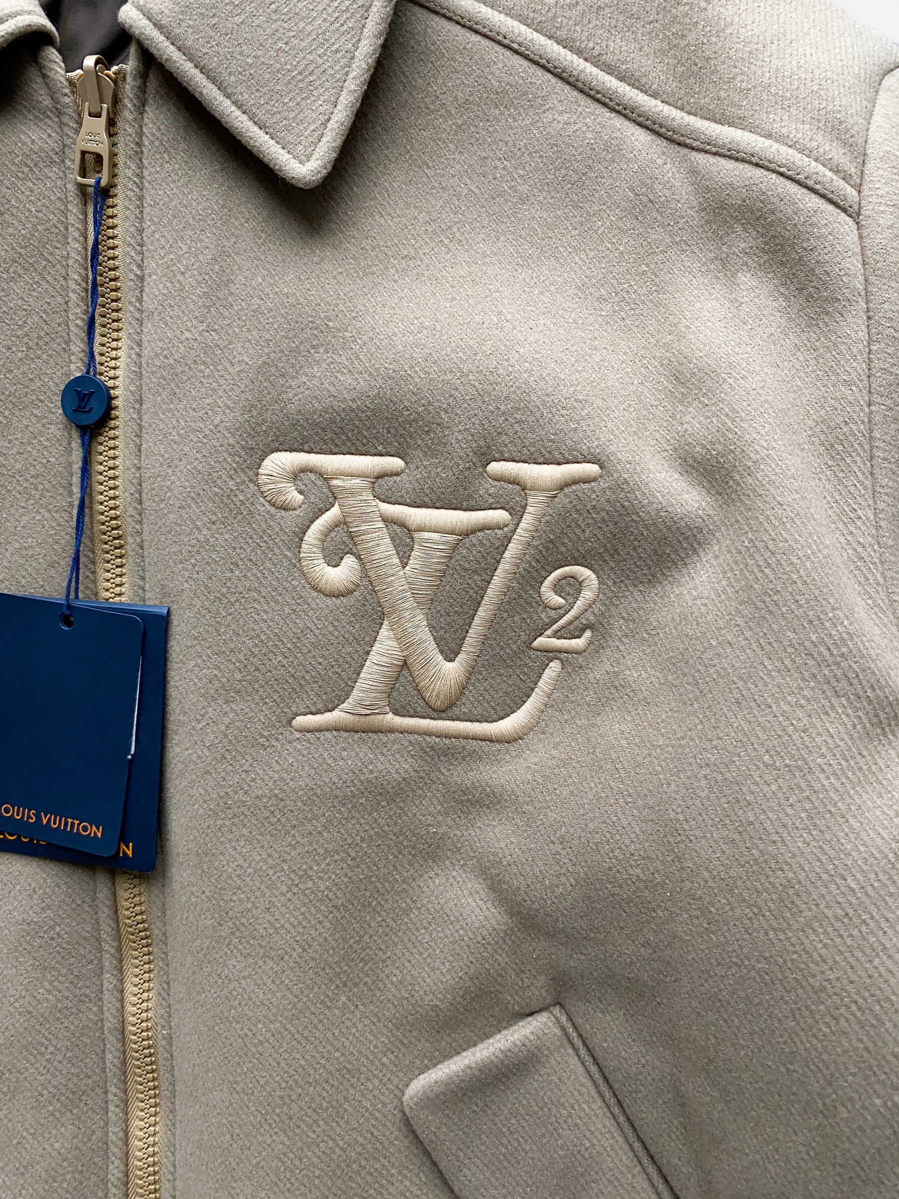 Reversible wool bomber jacket with monogram