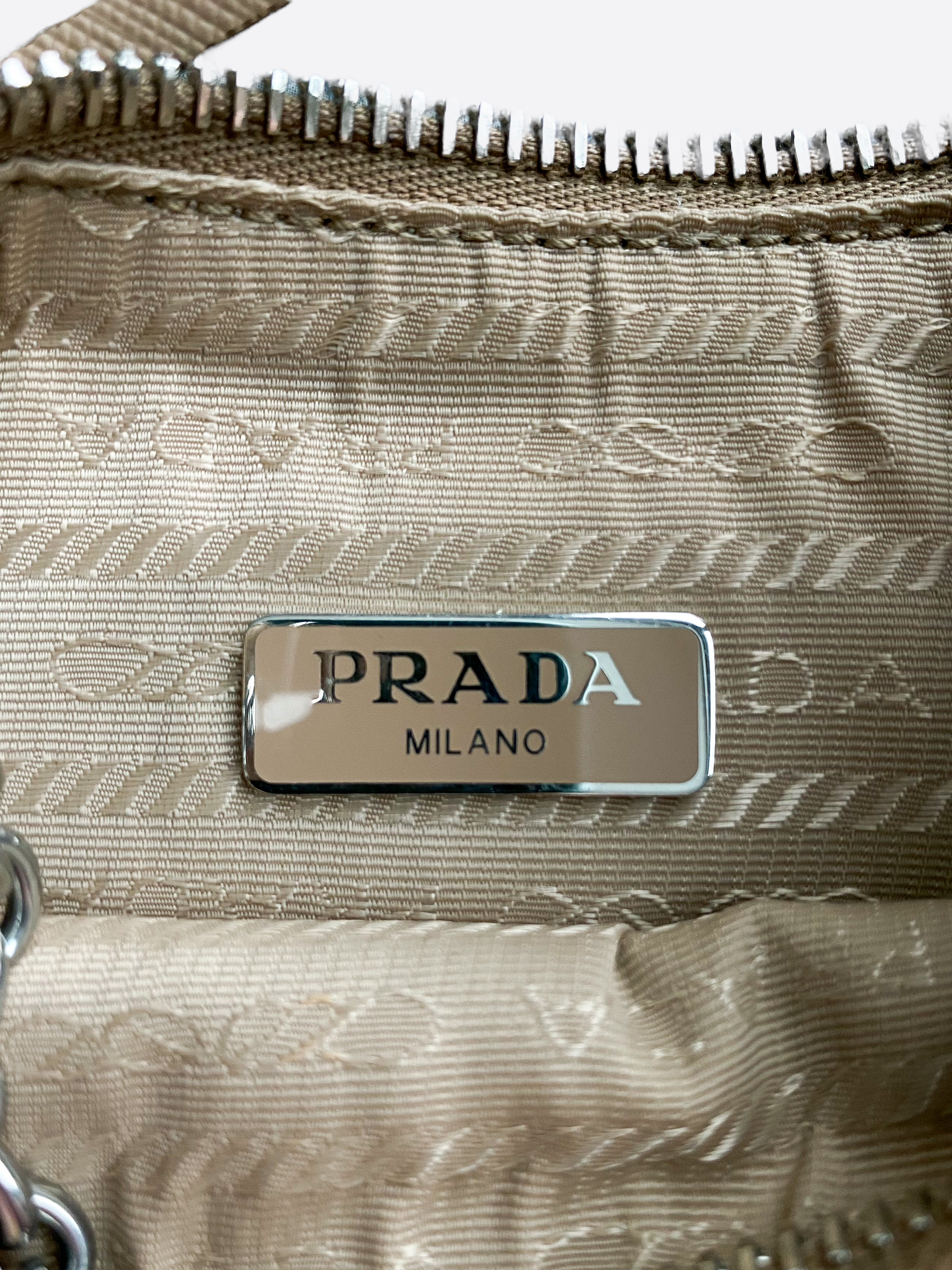 Shop PRADA Padded Re-Nylon shoulder bag Desert Beige 1BC151_RDJN