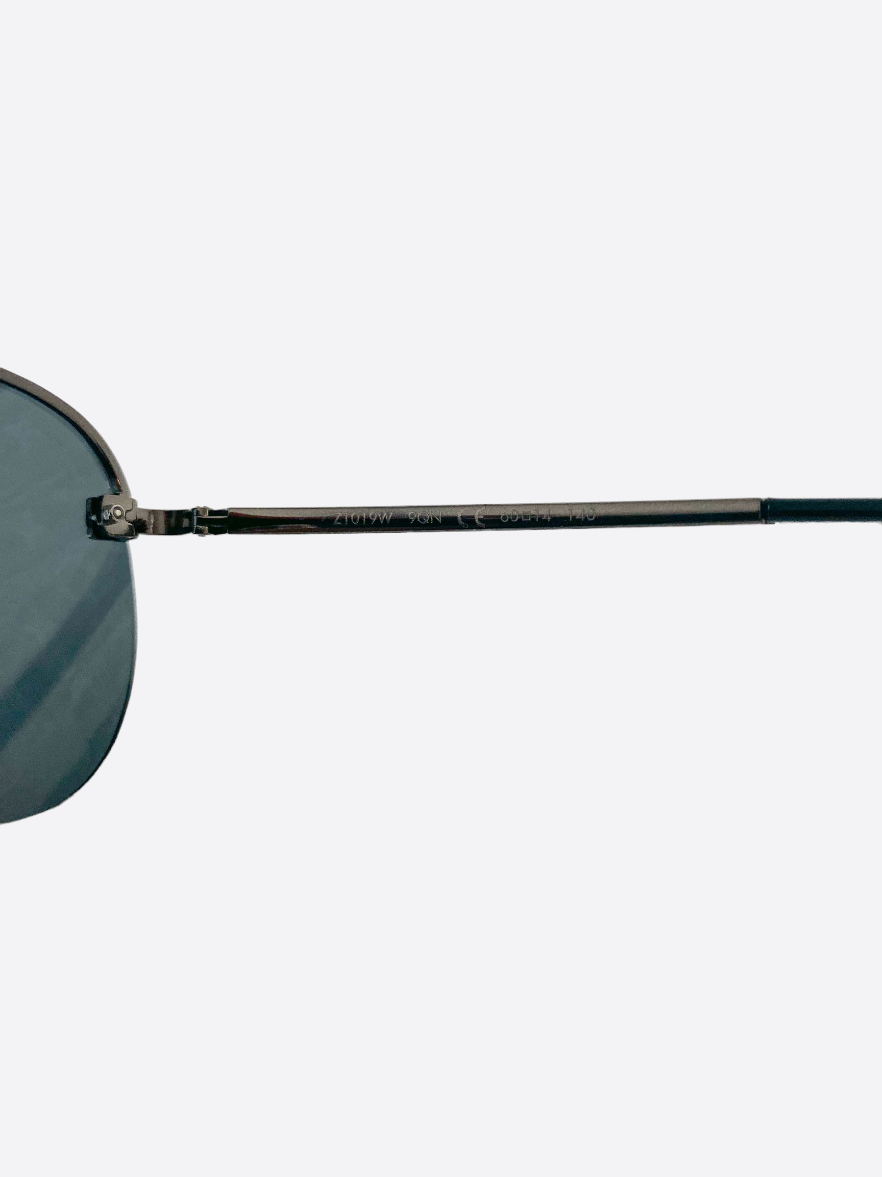 Louis Vuitton Clockwise Sunglasses Silver Metal. Size W