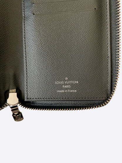 Louis Vuitton Monogram Eclipse Vertical Zippy Wallet