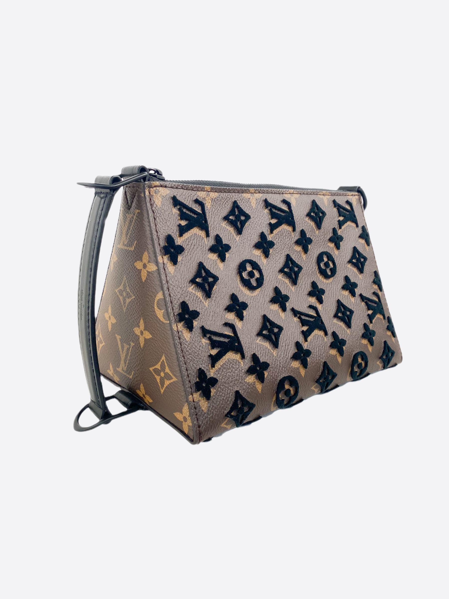 Shop authentic Louis Vuitton Monogram Tuffetage Triangle Messenger